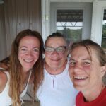 three happy women who want to stay in a grain bin